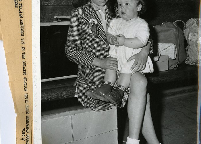 Chiasso Station Italian refugees, a small girl and an infant, at train station ... photo