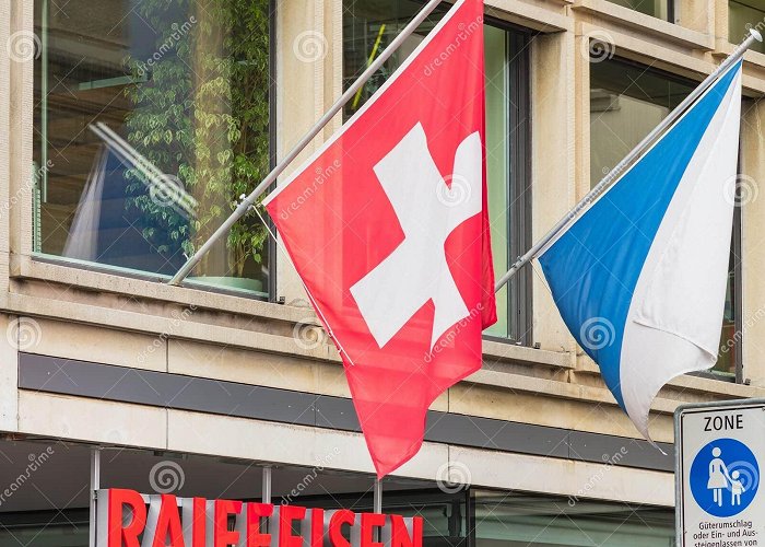 Raiffeisen Switzerland headquarters Office of the Raiffeisen Bank Decorated with Flags Editorial ... photo