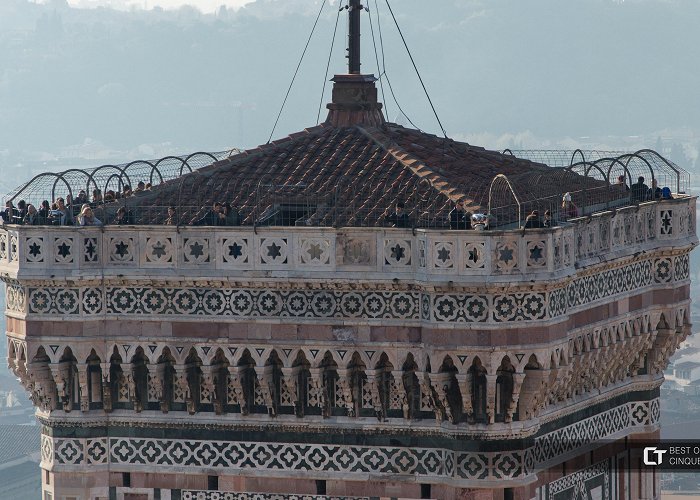 Belltower by Giotto Florence. Tourists on Giotto's bell tower - view from the dome of ... photo