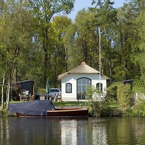 Cozy farm chalet on the water Villa Sint Nicolaasga Exterior photo