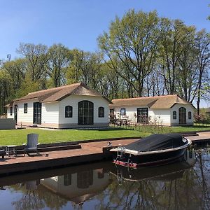 Cozy Farm Chalet On The Water Villa Sint Nicolaasga Exterior photo