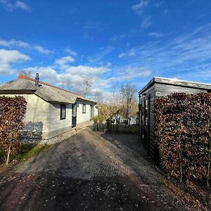 Cozy farm chalet on the water Villa Sint Nicolaasga Exterior photo